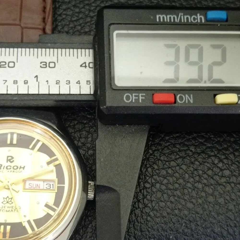 Vintage 1984 Ricoh Automatic Mens Silver Watch W/daydate & Gold accents